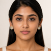 Indian model wearing Swarneva Celestial Dewdrop flower earrings – 20x20mm, diamond petals, two-tone gold
