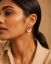 Swarneva stainless steel ivory enamel hoop earrings, 25mm x 25mm, styled on Indian model