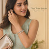 Flora Twine Bracelet video – gold alloy, cubic zirconia stones, L48 x W54 mm, 9.4 g, worn.