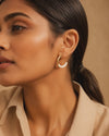 Swarneva stainless steel ivory enamel hoop earrings, 25mm x 25mm, wore by model in video