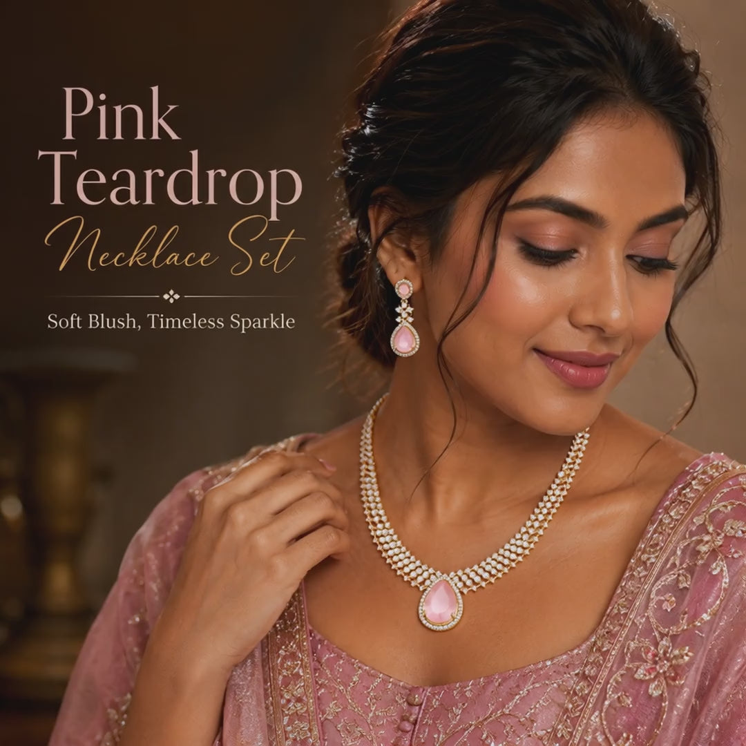 Swarneva The Blush Monarch Set video – gold alloy, pink pear-cut stones and cubic zirconia, earrings 20 x 22 mm, necklace 115 x 90 mm, total weight 32.70 grams, model showcasing matching set