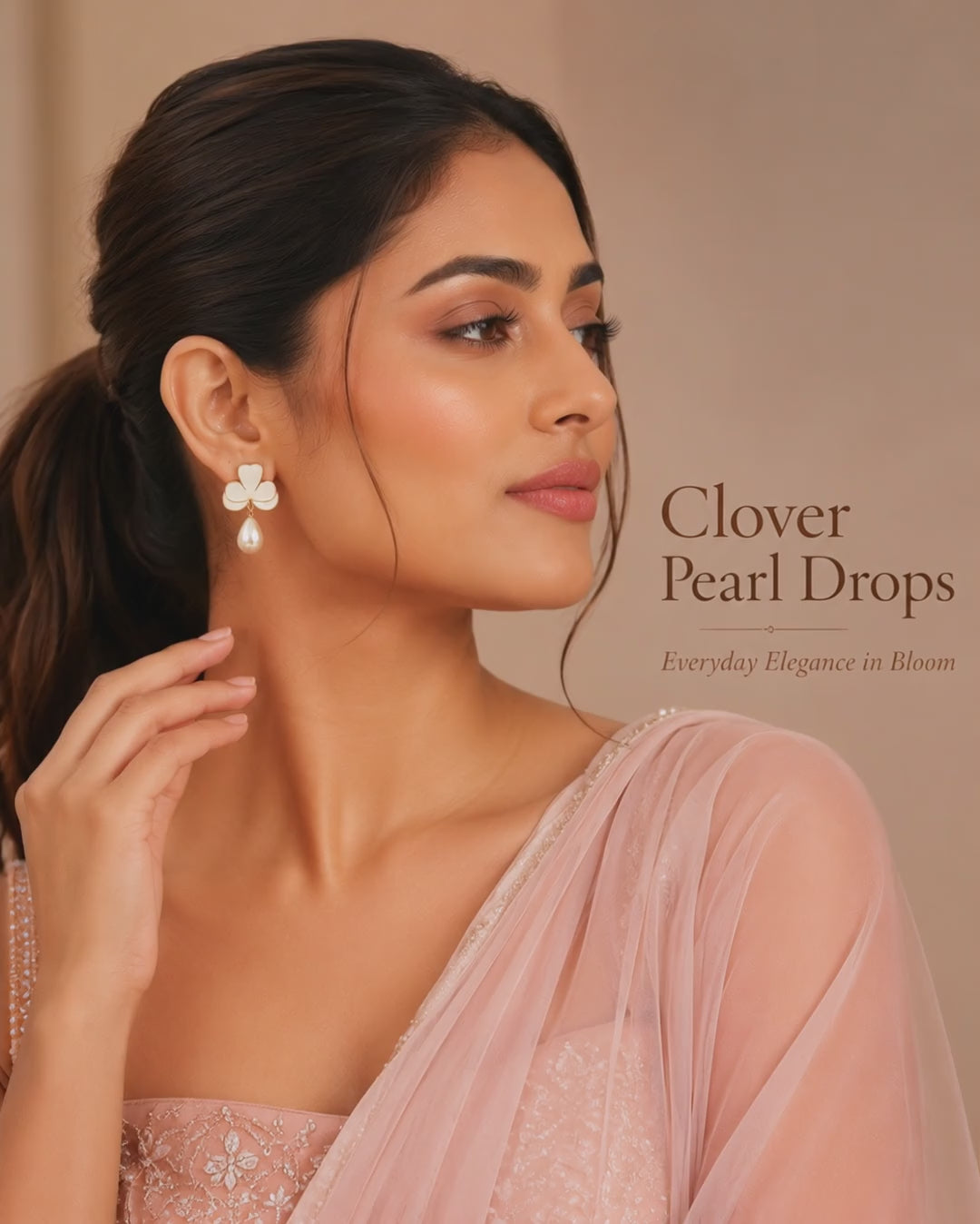 Swarneva Clover Pearl Drops video – stainless steel, pearl-white detailing, 14mm x 14mm, 4.1g, elegant close-up reveal and styling shot