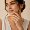 Indian female model wearing Aura Eclipse Ring in gold alloy and rhodium variants, L 1 x W 10 mm