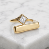 Swarneva The Modern Gold Bar Ring — gold-tone stainless steel bar ring with pink CZ stone, adjustable, minimalist statement ring