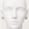 White silicone head with Swarneva Aurelia Emerald-Cut Earring – close-up of emerald-cut solitaire with full pave halo, two-tone metal, 4.2g