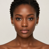 African model wearing Swarneva The Aurelia Emerald-Cut Earring – two-tone silver/yellow gold, emerald-cut center with pave halo, 11x11mm rounded square