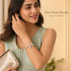 Indian female model styling gold alloy Flora Twine Bracelet, L48 x W54 mm, floral CZ sparkle.