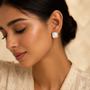 Swarneva gold-tone stainless steel ivory mosaic stud earrings, 12mm x 12mm, styled on Indian model for elegant daily wear