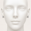 Silver earrings on a mannequin head against a white background