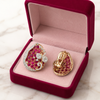 Swarneva Royal Ruby Mosaic Earrings in deep ruby box – one face up, one showing clip, on white marble