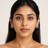 Indian model wearing Swarneva Ruby Center Diamond Lattice Studs – round 22mm silver earrings, red ruby center with diamond lattice
