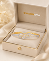 The Ceres Bracelet in premium Swarneva jewelry box, gold alloy two-tone bracelet, 45 x 55 mm