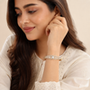 Swarneva The Ritz Silhouette Bracelet on Indian female model, gold alloy bracelet with cubic zirconia, 45 x 55 mm
