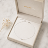 Swarneva Aura Floating Solitaire Necklace in premium cream luxury jewelry gift box