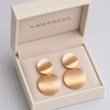 Swarneva Double Disc Drop Earrings in premium cream luxury jewelry gift box