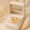 Swarneva Fluid Wave Ring in premium cream luxury jewelry gift box