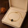 Swarneva Gold Clover Bracelet in premium cream luxury jewelry gift box