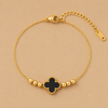 Swarneva Gold Clover Bracelet Black enamel milgrain clover 3+3 gold beads fine chain adjustable 4.5g product photography