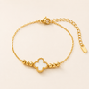Swarneva Gold Clover Bracelet White enamel milgrain clover variant product photography
