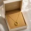 Swarneva Infiniti Arc Necklace in premium cream luxury jewelry gift box