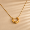 Swarneva Lumina Fluid U-Necklace chunky mirror-polished gold U pendant flat snake chain 14x10mm 5.5g product photography