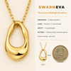 Swarneva The Lumina Midnight Necklace — scale reference, hollow gold oval pendant 19x12mm beside Rs 5 coin