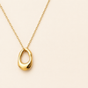 Swarneva The Lumina Midnight Necklace — hollow open oval gold pendant, mirror-polish, 19x12mm, 5.1g, stainless steel, studio photography