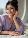 Swarneva Lumina Violet Eternity Band worn by Indian model hand, violet baguette eternity ring editorial