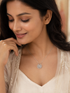 Swarneva Magnetic Rose Clover Necklace worn by Indian model collarbone, 2-in-1 rose gold crystal clover editorial