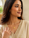 Swarneva Magnetic White Clover Necklace worn by Indian model collarbone, 2-in-1 white crystal clover pendant editorial