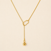 Swarneva Minimalist Ball Drop Y-Necklace flat snake chain oval loop polished gold ball drop 8.1g product photography