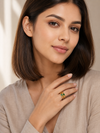 Swarneva Royal Green Emerald Wide Band Ring worn by Indian model, gold wide band green emerald ring editorial