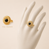 Swarneva Vintage Gold Sunburst Cocktail Ring mannequin catalog card, black onyx sunburst adjustable